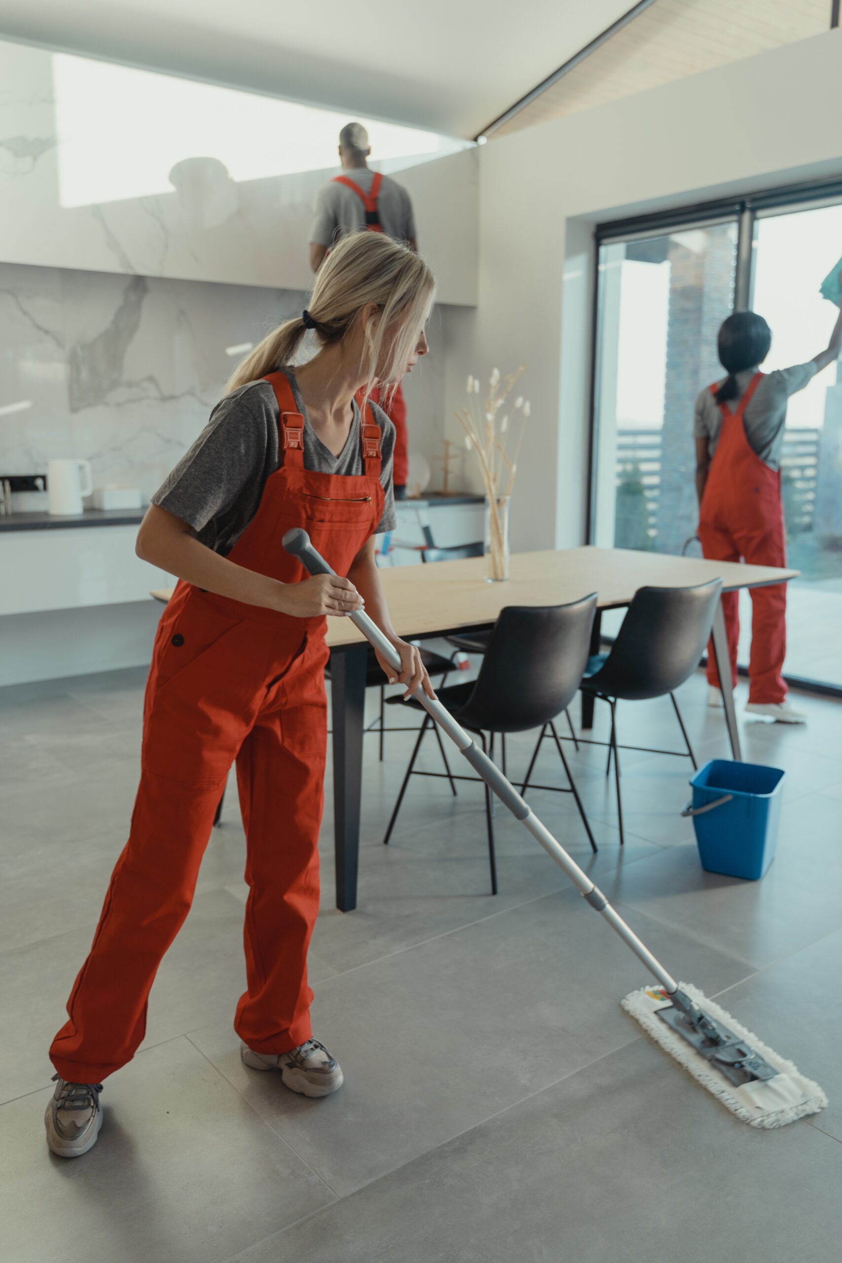 Cleaning staff mopping floors at an office — Business and office cleaning in Stockholm