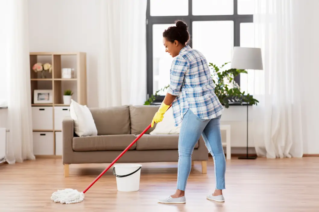 Woman mopping floors